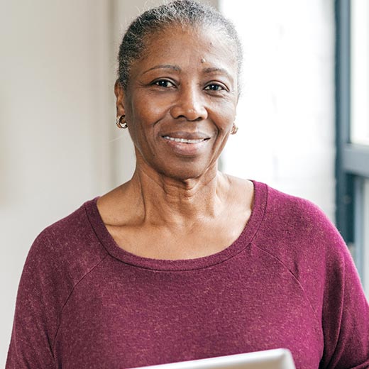 Photo of African American senior woman smiling