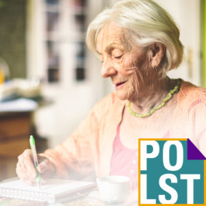 Photo of senior woman, at her home, writing notes about POLST