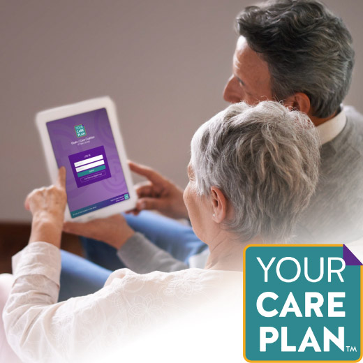 Couple viewing the Your CarePlan(TM) via a tablet